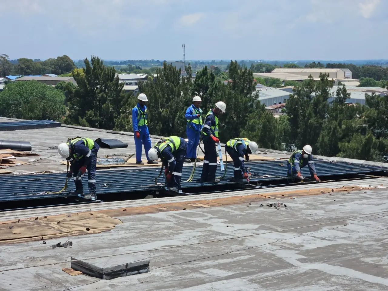 Roof sheet replacement on a large factory building in Gauteng